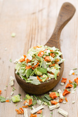 Dried vegetable spice. Bio herbs product. Finely chopped herbs.