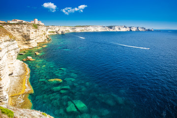 Bonifacio town on beautiful white rock cliff with sea bay, Corsica, France, Europe