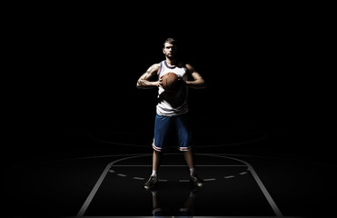 Fototapeta na wymiar Young man basketball player with ball in studio isolated