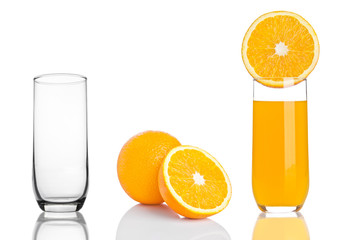 Glass of healthy organic orange juice on white