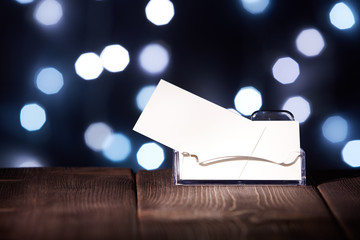 Obraz premium Professional blank business card in holder.