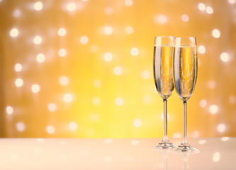 Champagne on a yellow background.