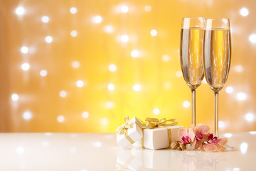 Champagne on a yellow background.