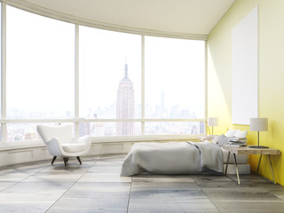 Side view of bedroom with yellow walls in New York