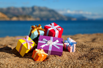 Gift boxes in a beach