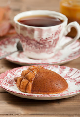 Homebaked Cake, Acorn Shape. Cup Of Tea. Toffee Souce.