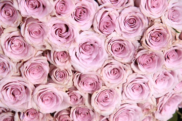 Purple rose wedding arrangement