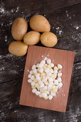 Goodies potatoes with potatoes on cutting board