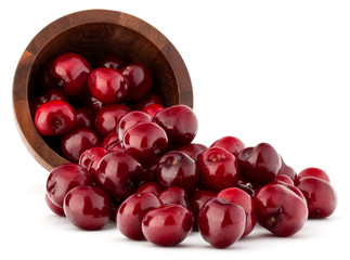 cherry berries in wooden bowl