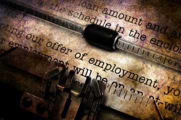 Employment form on vintage typewriter