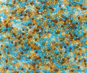 Mix golden, blue, brown,  Japanese beads. MIYUKI Delica.