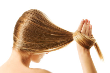 Long blond human hair close-up.