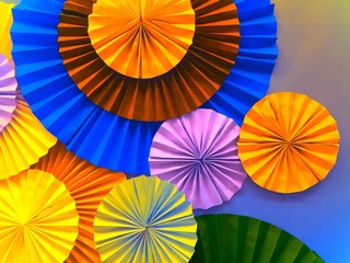 Colorful paper craft fan background 
