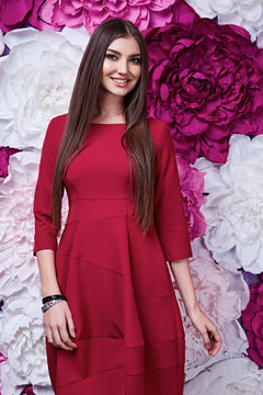 Portrait of young beautiful woman wear sexy red dress brunette