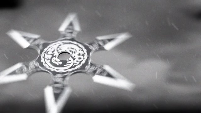 A Japanese Ninja Shuriken Flying in the Air