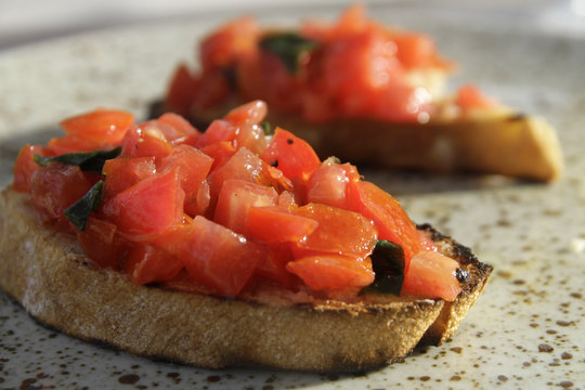 Italian starter bruschettas with tomatoes