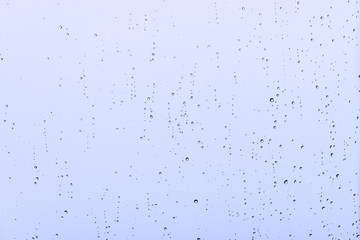 Rain / Water drop of rain on glass with outdoor background