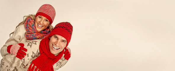 Couple in scarf and hat.