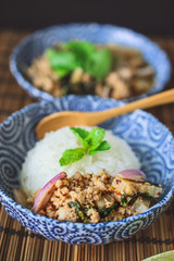 Thai Spicy Minced Pork on Wood Background, Thai Food on Wood Bac
