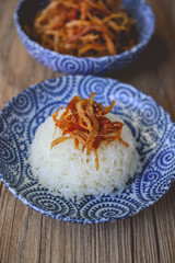 Thai Dried Shredded Pork on Blue Plate and Wood Backgroound, Tha