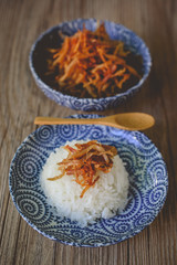 Thai Dried Shredded Pork on Blue Plate and Wood Backgroound, Tha