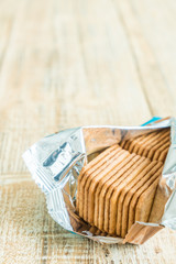 Fototapeta na wymiar Stacked Biscuits on wooden background