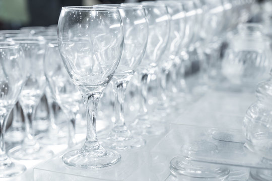 Many empty glasses in a line