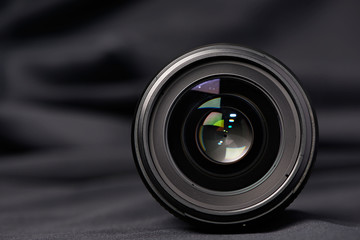 Photo lens front view on blurred