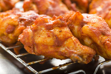Roasted chicken wings with spicy sauce