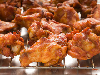 Roasted chicken wings with spicy sauce