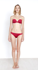 Obraz premium Standard model tests of young pretty woman on a white background