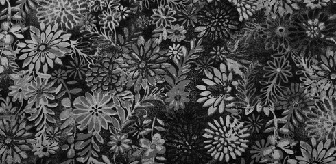 black and silver floral pattern on fabric
