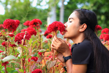 woman with flowers in garden