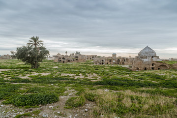 Fototapeta na wymiar Ruins of old building over ancient castle in Kirkuk,Iraq