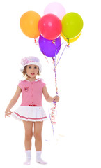 Fototapeta na wymiar Girl holding balloons