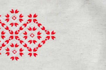 Element handmade embroidery by red and white cotton threads. Vintage texture design.