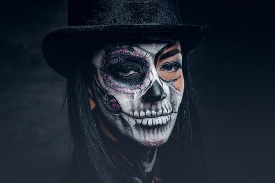  Close up portrait of female with skull make up.