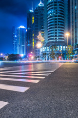 Fototapeta premium empty asphalt road through modern city in China.