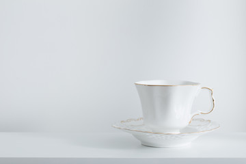 white cup on white background