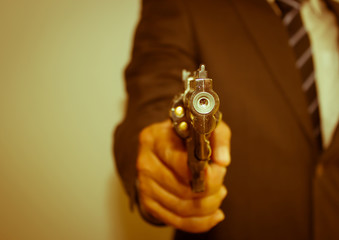 Businessman with gun 