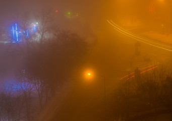 Aerial View of Light Trails on a Foggy Night