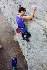 Two friends have been climbing on the rocks.