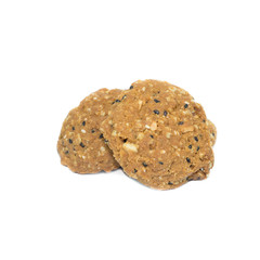 Oatmeal cookies with nuts and sesame seeds isolated on white bac