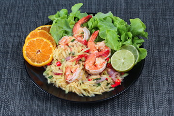 Home made,Spicy sour minced green mango salad with shrimp topped sliced green lemon,Chinese orange and lettuce. 
