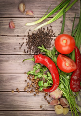wood background with vegetables