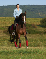 Enjoying horseback riding in nature