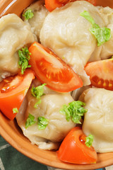 Steamed dumplings above view closeup