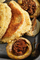 Overhead oven tray with potato and cutlets