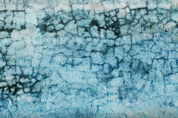 Fototapeta premium Abstract blue tone cement floor crack pattern background