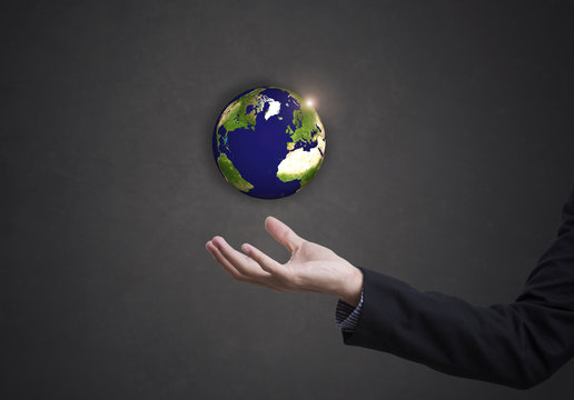 business hand holding globe earth concept business social. Elements of this image furnished by NASA